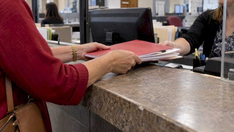 Estate filing packet at a Florida courthouse counter